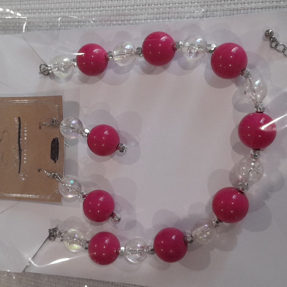 Pink and clear necklace and earrings set with silver hardware